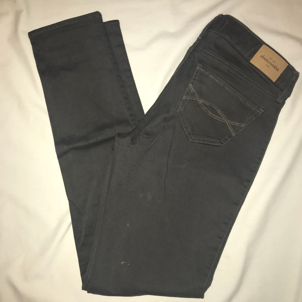 Abercrombie kids skinny low-rise dark gray jeans.